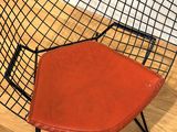a chair that is sitting on a hard wood floor