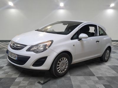a picture of a small white car in a room