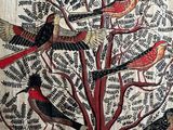 many birds that are sitting on the branches of a tree