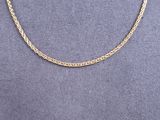 a gold chain necklace on a mannequin mannequin mannequin mannequin mannequin mannequin mannequin mannequin manne