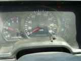 a close up of a speedometer in a car