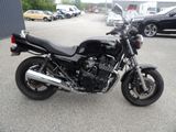 a motorcycle that is parked in a parking lot