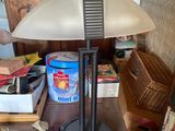a lamp that is sitting on a table in a room