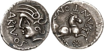 a silver coin with an image of a horse on it