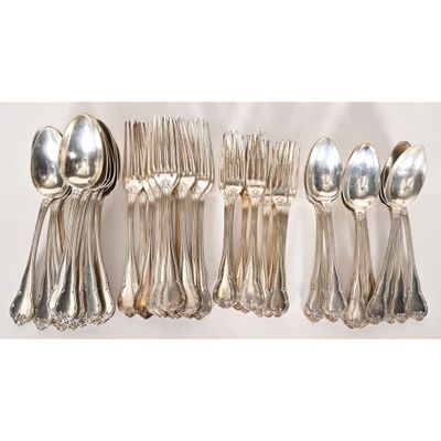 five silver spoons and six silver spoons on the table
