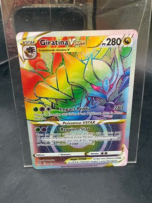 a close up of a pokemon card in a clear box
