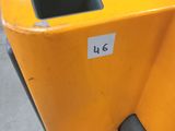 a close up of a yellow machine with a number on it