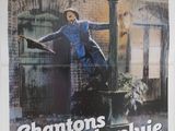 affiche de cinéma représentant un homme en costume bleu sautant sous la pluie