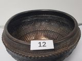 an image of a metal bowl with a number on it