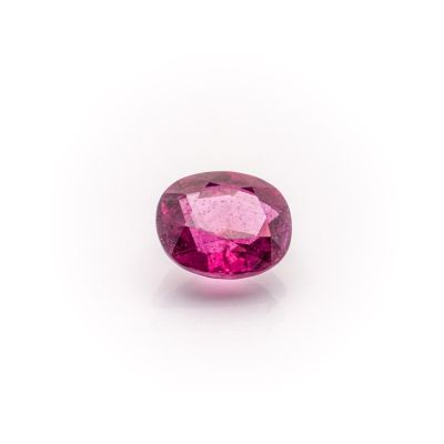 a pink tourmaline gems on a white background