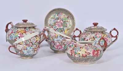 three different types of teapots and saucers on the table
