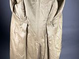 an image of a beige coat on a mannequin mannequin mannequin mannequin mannequin mannequin mannequin mannequin