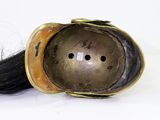 an image of a hair piece with a helmet on it