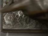 a close up of a metal object with a ring on it
