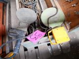 a pile of assorted construction equipment in a box
