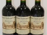three bottles of wine sitting on top of a table next to each other