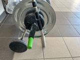a picture of a pair of baseball bats in a bucket
