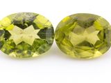two yellow sapphires on a white background