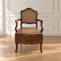 FAUTEUIL d'aisance à fond de canne en bois naturel à décor m…