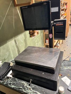a computer desk with a monitor and a laptop on top of it