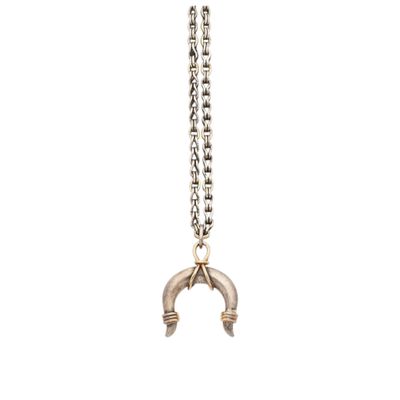 a silver necklace with a chain that has a hammer on it