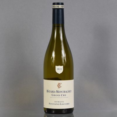a bottle of wine that is sitting on a table