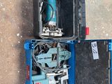 a blue box with a drill and other tools in it