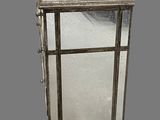 an image of a metal table with a mirror on top of it