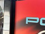 a picture of a car parked in a parking lot