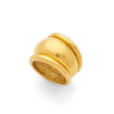 an 18k yellow gold ring with a domed design