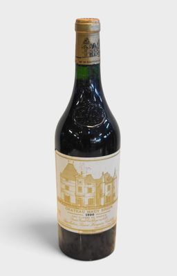 a bottle of wine that is sitting on a table