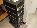 boxes stacked on top of each other on the floor in a room