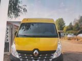 a picture of a yellow van parked in a parking lot