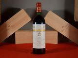 a bottle of wine that is sitting on a table