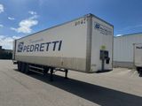 a semi trailer that is parked in a parking lot
