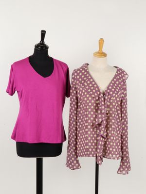 two women ' s shirts on a mannequin stand next to each other