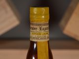 a bottle of liquor that is sitting on a table