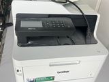a printer that is sitting on top of a table
