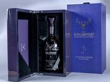 an image of a bottle of whisky in a purple box