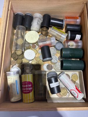 a wooden box filled with lots of different types of cosmetics