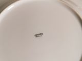 a lot of plates that are stacked on top of each other