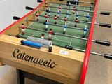 a foosball table in the middle of a room