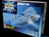 a box with a model of a star wars ship in it