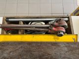 a box full of tools sitting on the floor