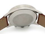 an image of a close up of a watch on a white surface