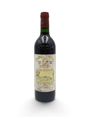 an old bottle of red wine with a map on it
