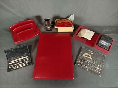 a red desk with a red desk top and a red desk chair