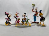 disney figurines of donald duck, goofy duck, goofy duck, goofy duck, goofy duck, goofy duck, goofy duck, goofy duck, goofy duck,