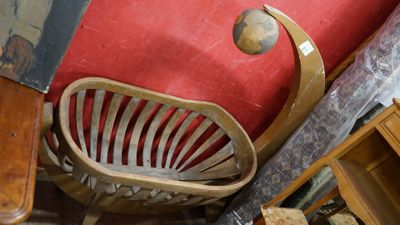 a chair and a table in a room with a red wall