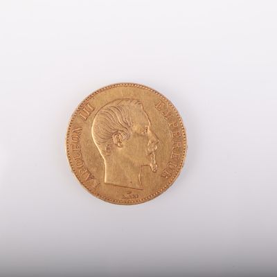 l'image d'une pièce d'or représentant le profil d'un homme